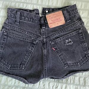 Levi’s high rise distressed black denim shorts